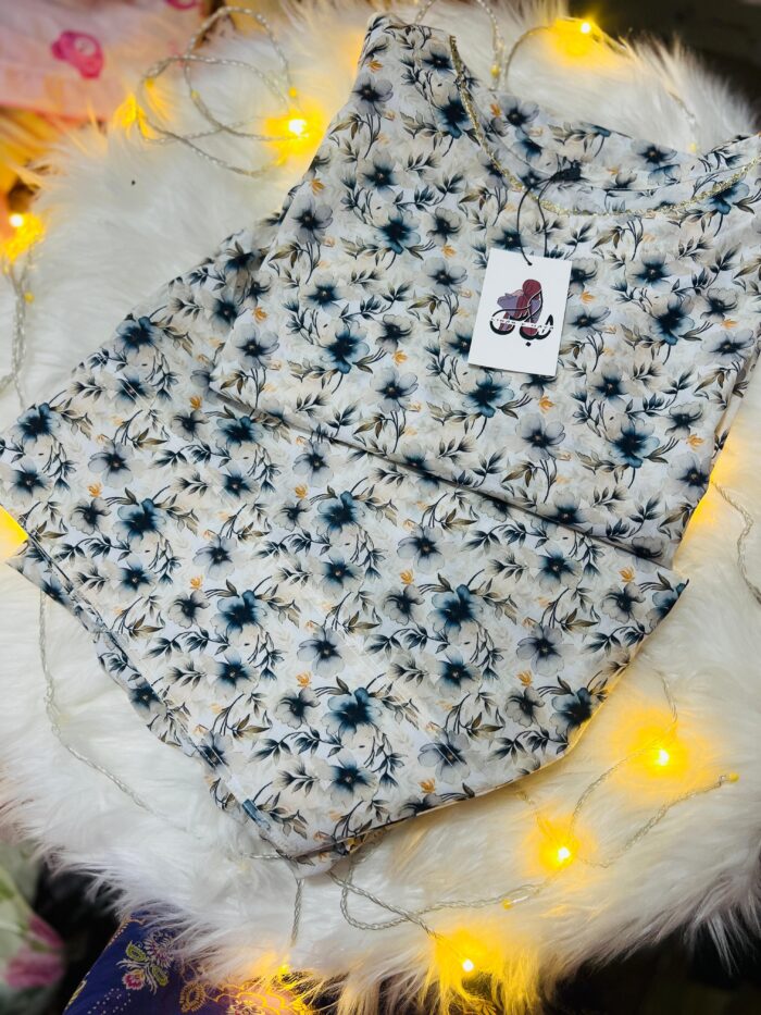 Off-White with Navy Blue Floral Print - Image 1
